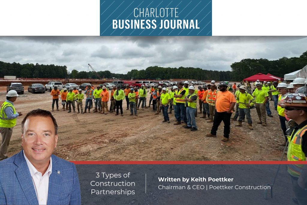 Construction workers listening to a superintendent