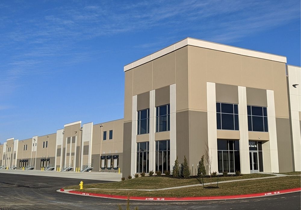 Close-up of the entrance to a large tan distribution center