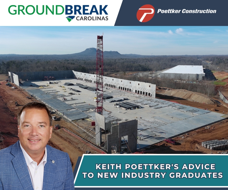 Keith Poettker in front of a construction site