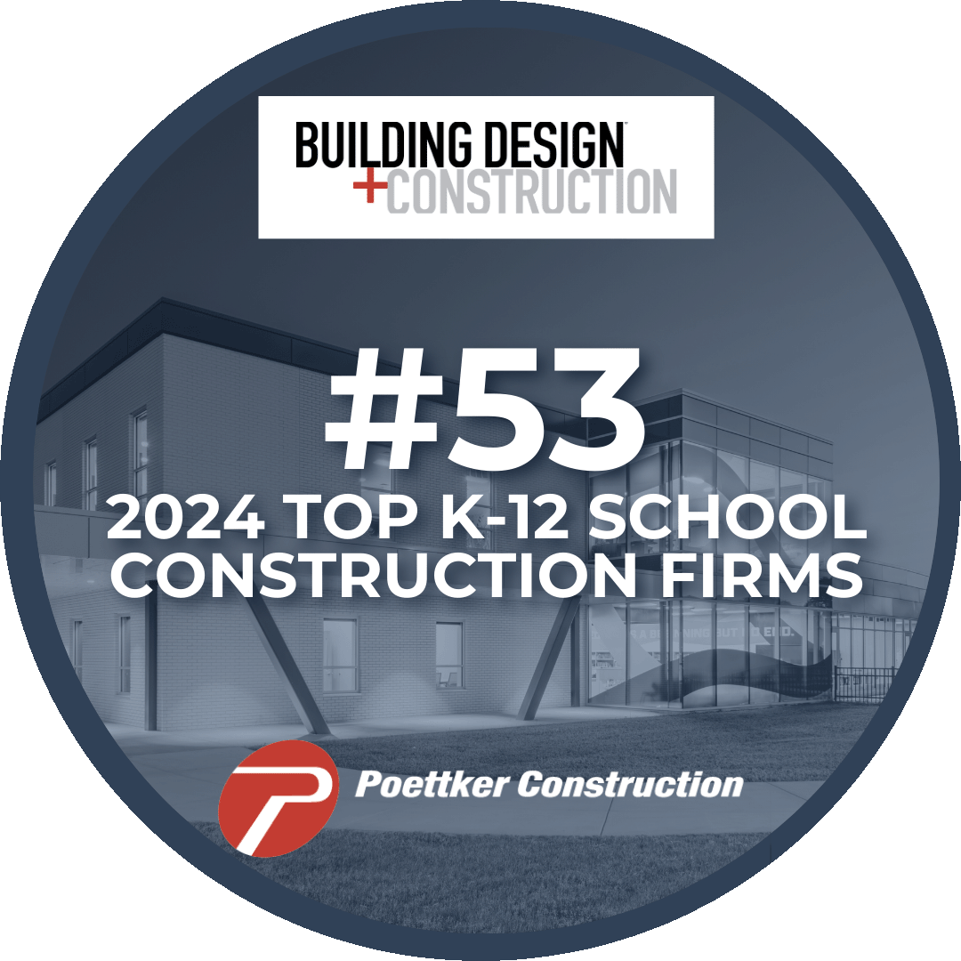 Building Design+Construction logo in a round emblem with a picture of a school