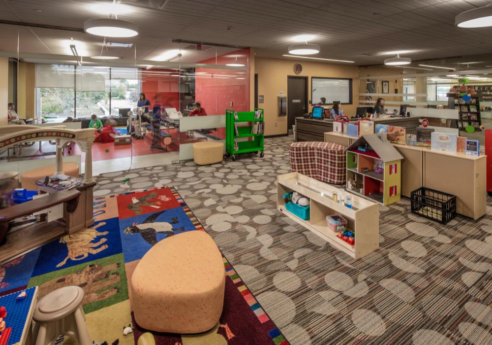 Effingham Library_Website Body_1000x700 (2) Area with shelves and toys for kids to play