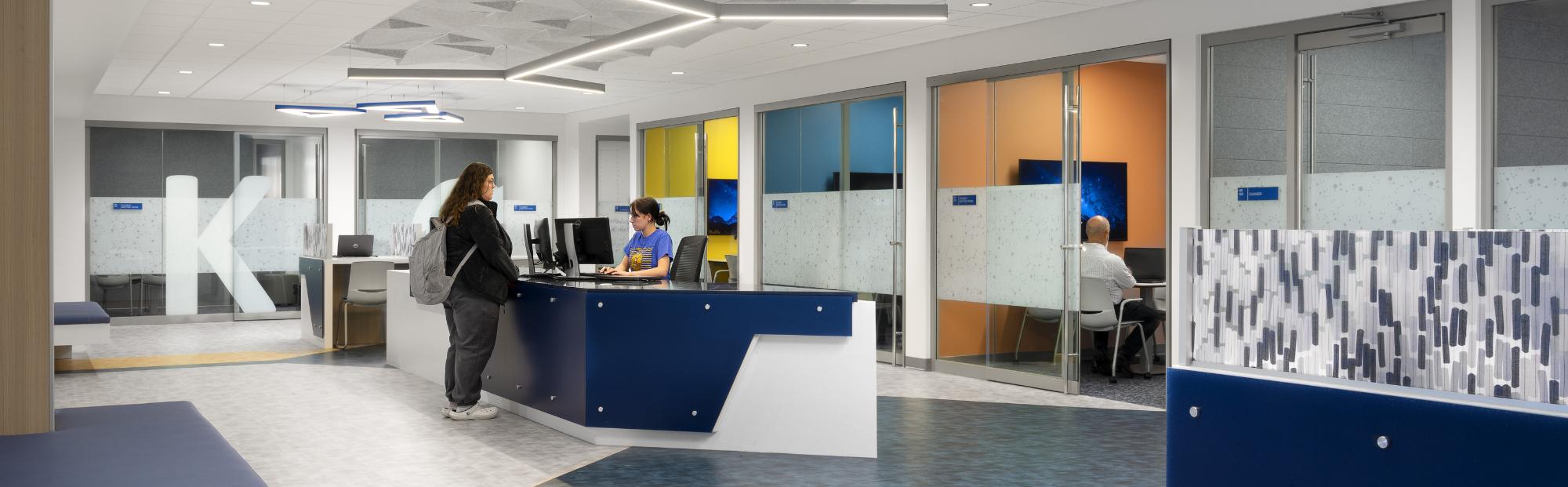 Registration desk at a college with private offices