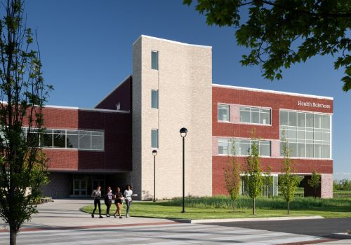 red brick exterior health science building with windows