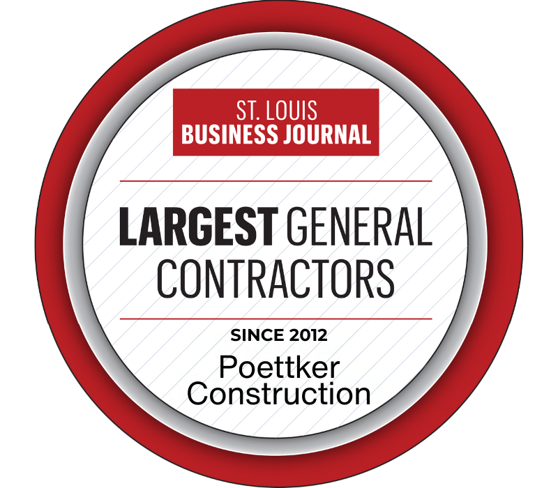 A round white emblem with the red St. Louis Business Journal logo