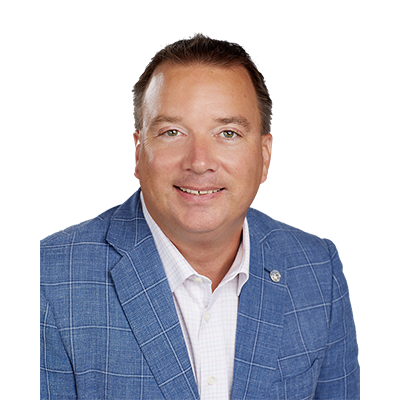 Headshot of a man in a plaid blazer