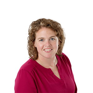 A woman with curly hair and a red shirt