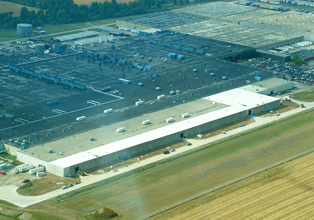 CTtA CVT Max Building_Website Body_1000x700 (5) Aerial view of a large manufacturing facility