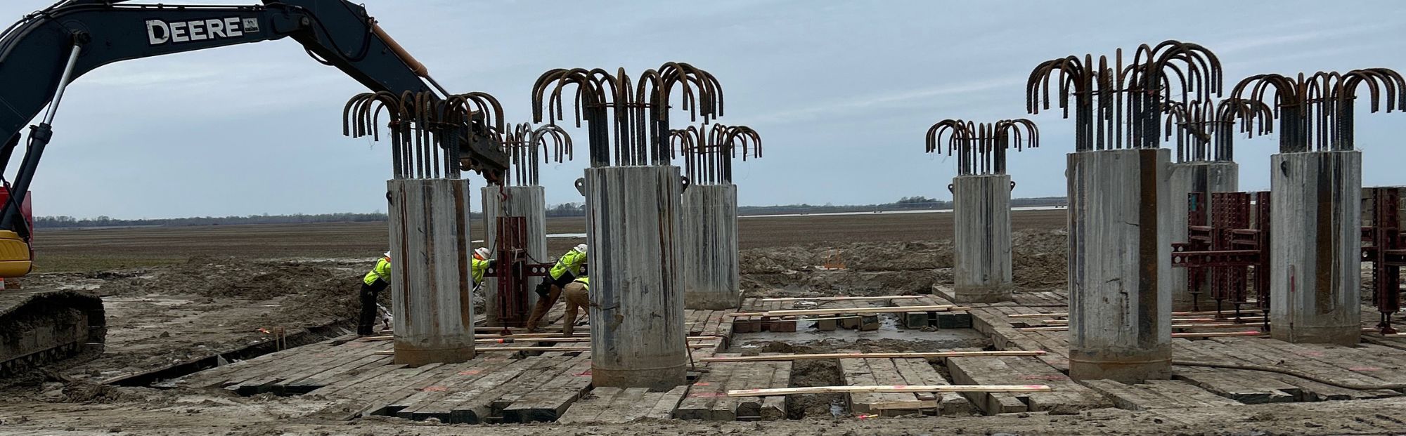 A crane at a utility construction job site