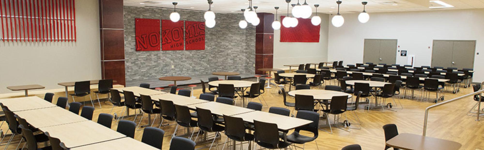high school cafeteria showing tables and chairs