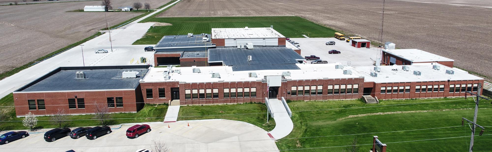 aerial of a red brick high school building