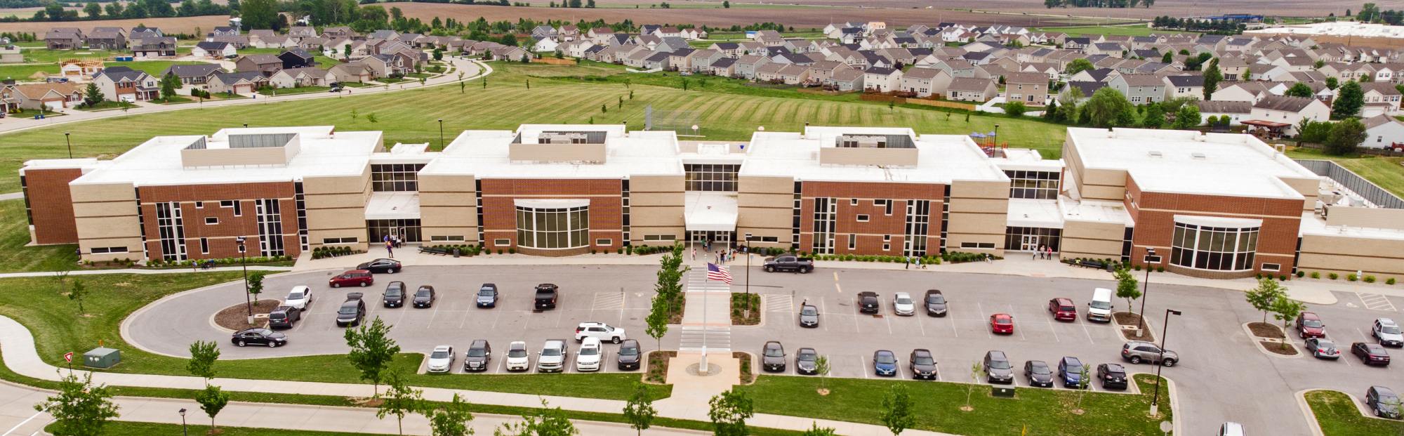 4 two-story buildings connected with enclosed hallways