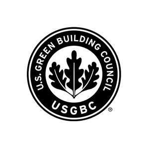 A round black and white emblem with three leaves