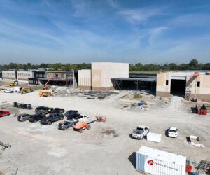 Exterior of a large, modular high school under construction