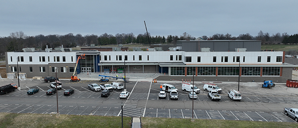 Columbia HS Aud_500_2026-01-05_0521_V-News Exterior of a high school under construction next to a crane