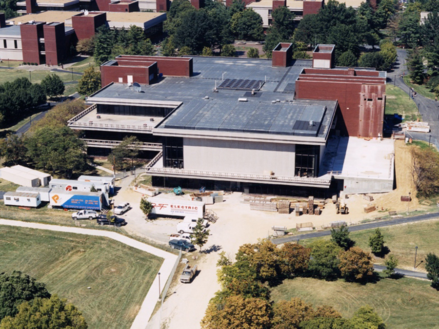 Aerial view of a complex college building with balconies