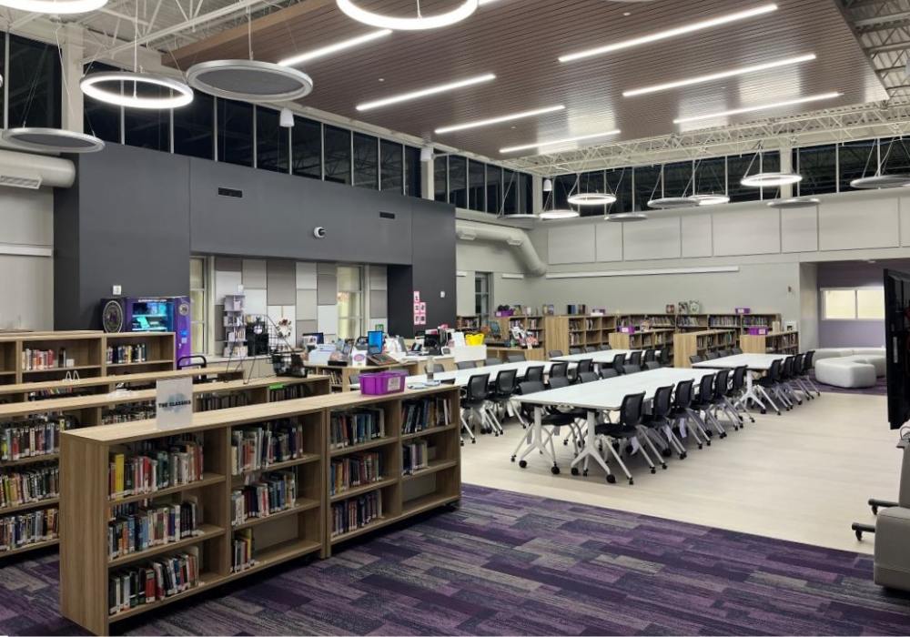 A bookcase next to a middle school cafeteria