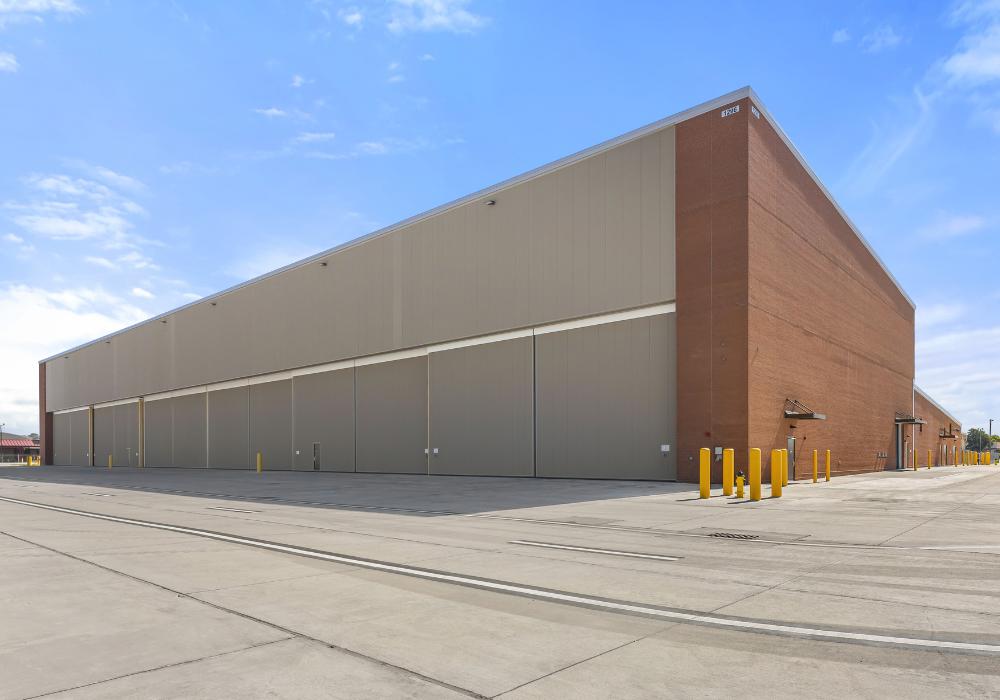 PEMB exterior showing 6 hangar bay doors