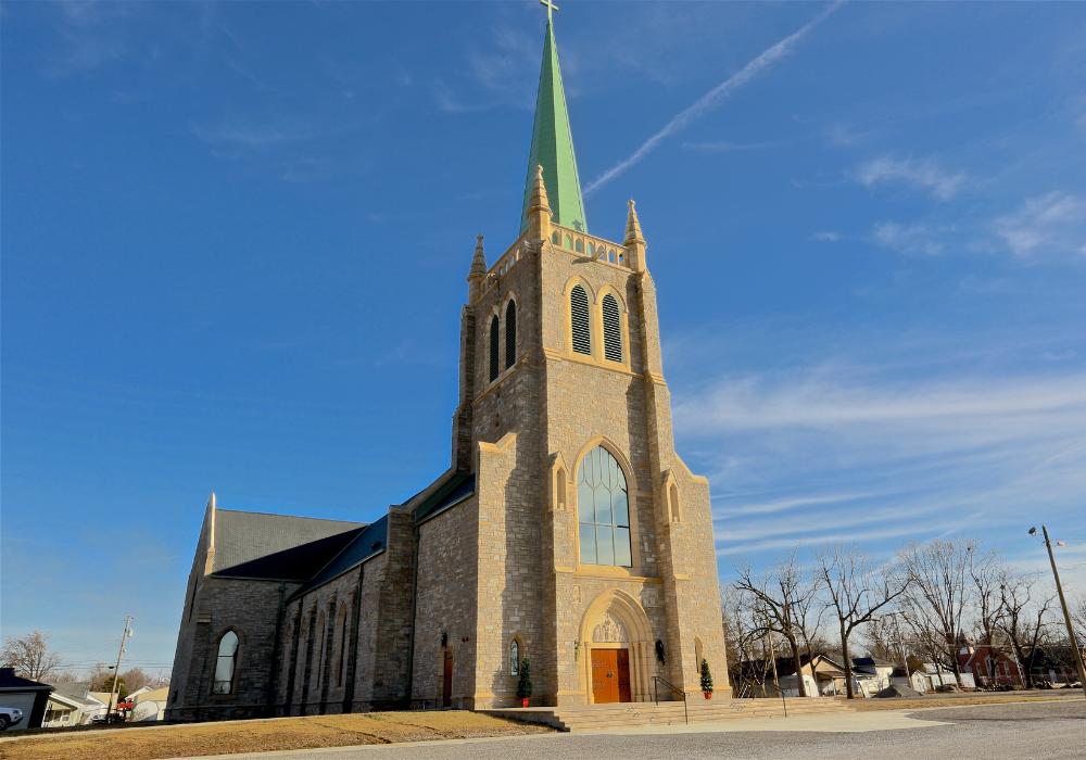 St. Kateri_Website Body_1000x700 (5) exterior of a church with light tan brick
