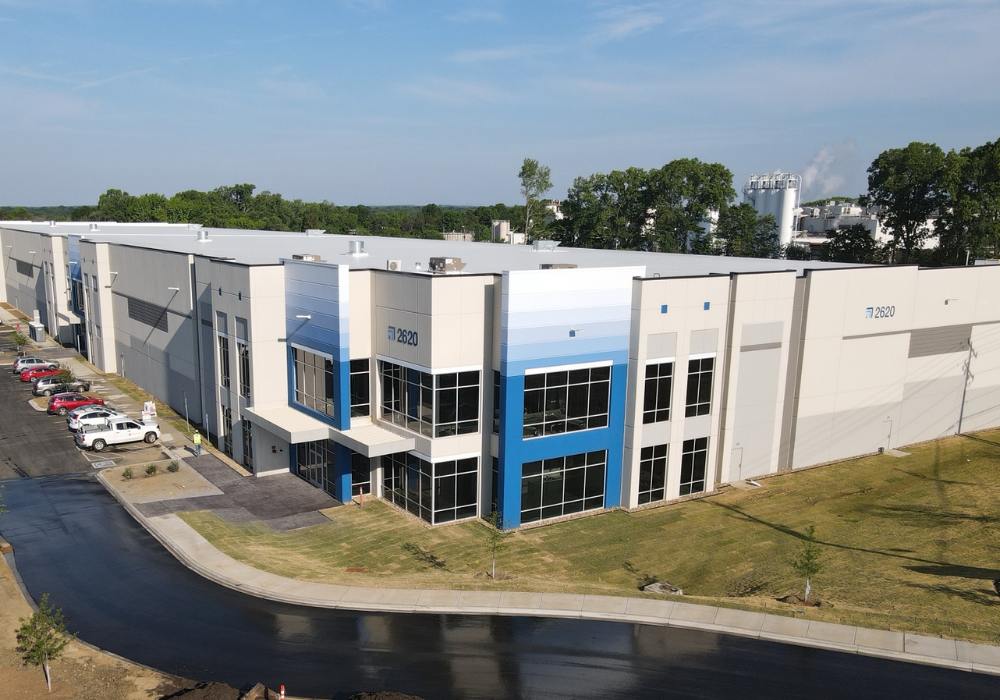 gray and blue distribution warehouse building