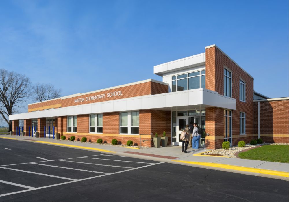 long brick elementary school building front entrance