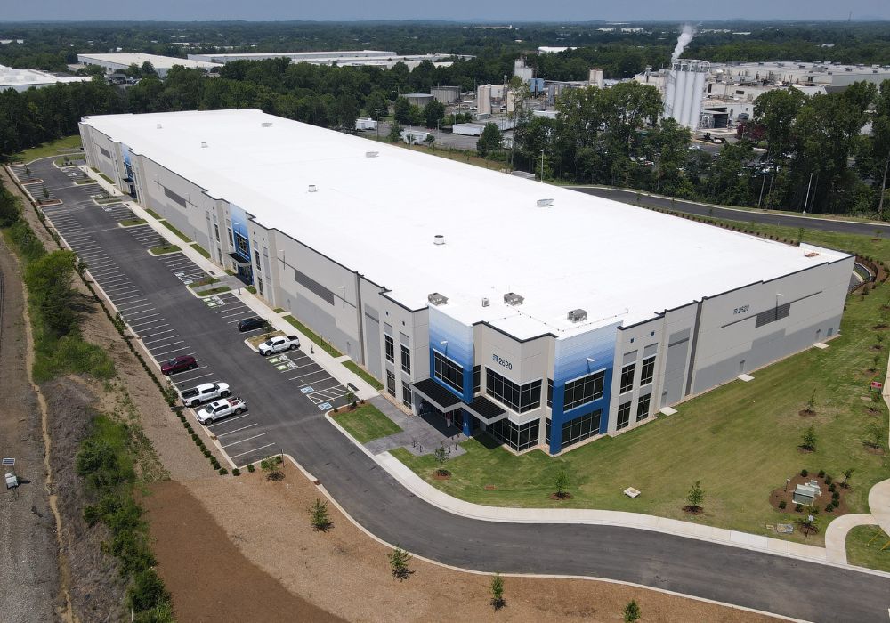 gray and blue distribution warehouse building