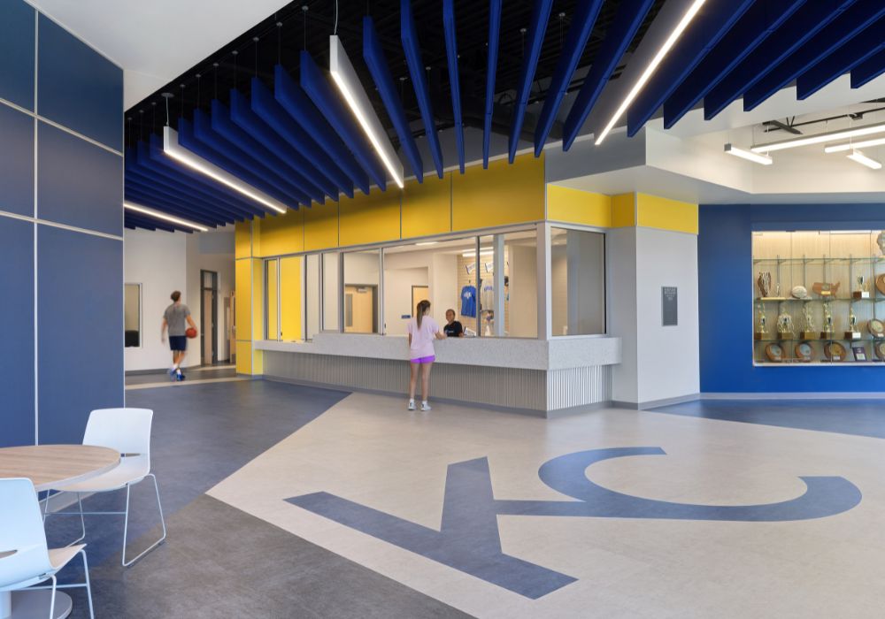 KC Gym Add_Website Body_1000x700 gym entrance lobby with blue acoustical panels