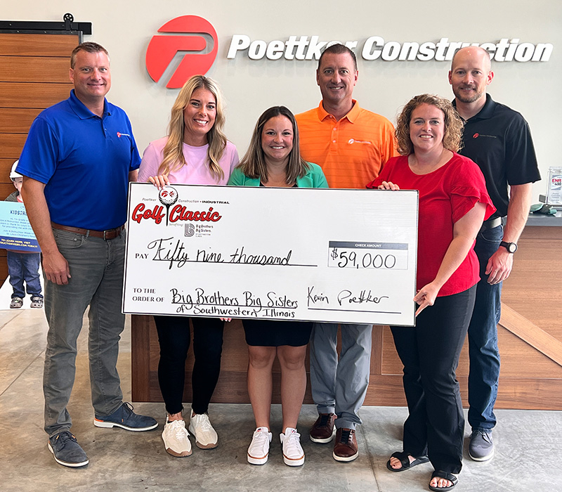 Poettker Construction presents a giant check to Big Brothers Big Sisters of Southwestern Illinois