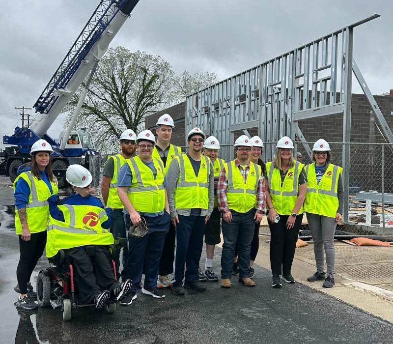 Community Link participants tour a Poettker Construction build site.